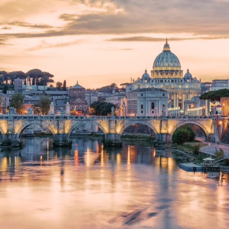 The city of Rome at sunset with the view on the Vatican